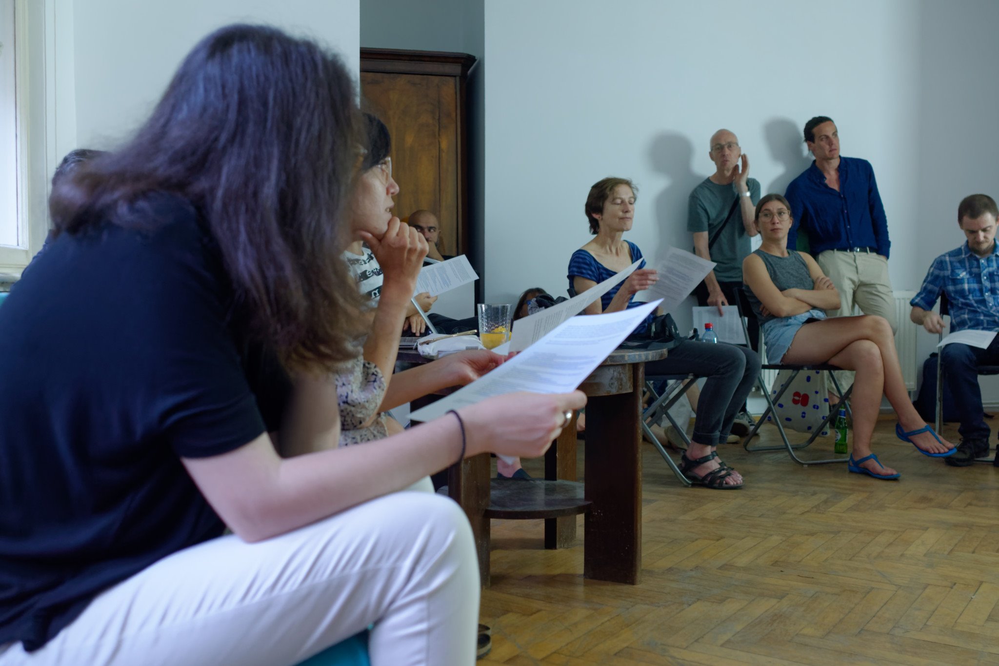 Attendants reading Constant's &quot;Dear Cultural Institution, There's an Elephant in the Room&quot; letter. Photo by Florian Cramer.